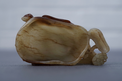 A Chinese lotus-shaped russet jade libation cup, 18/19th C.